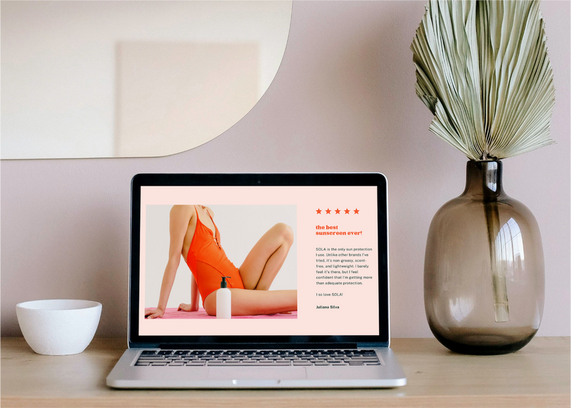 Maison 21G e-commerce website displayed on a laptop